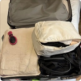 Maleta organizada con bolsas de compresión
